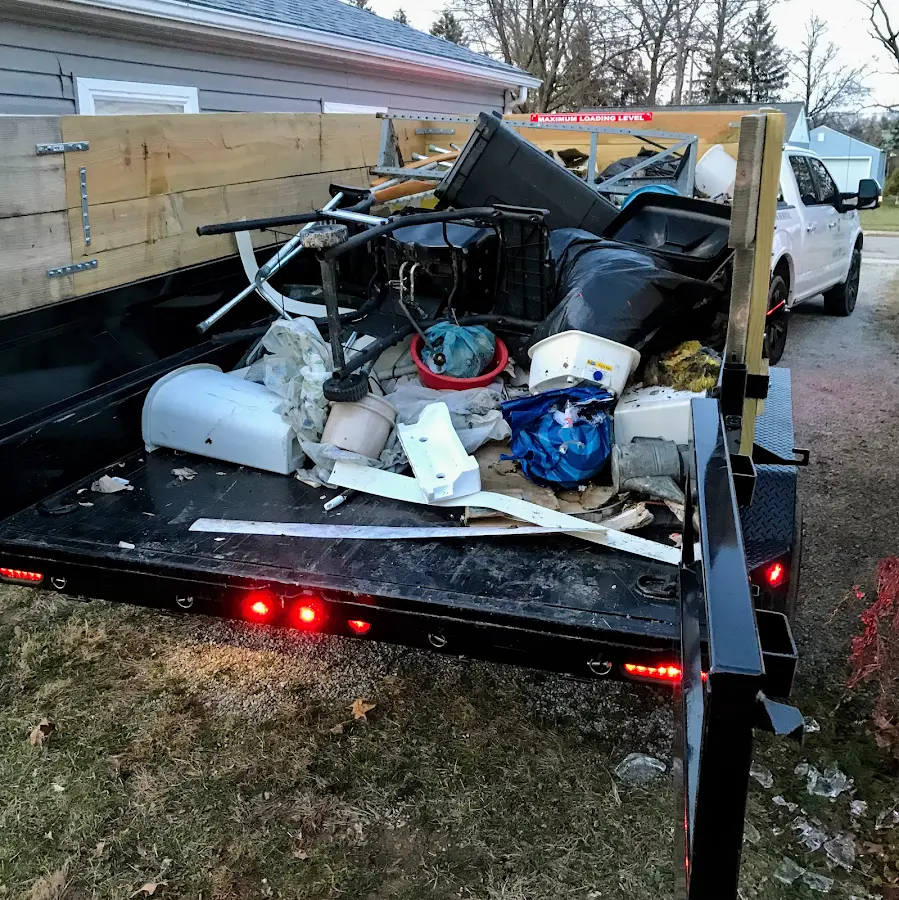 Roll-off dumpster delivered to a residential driveway in Cleves